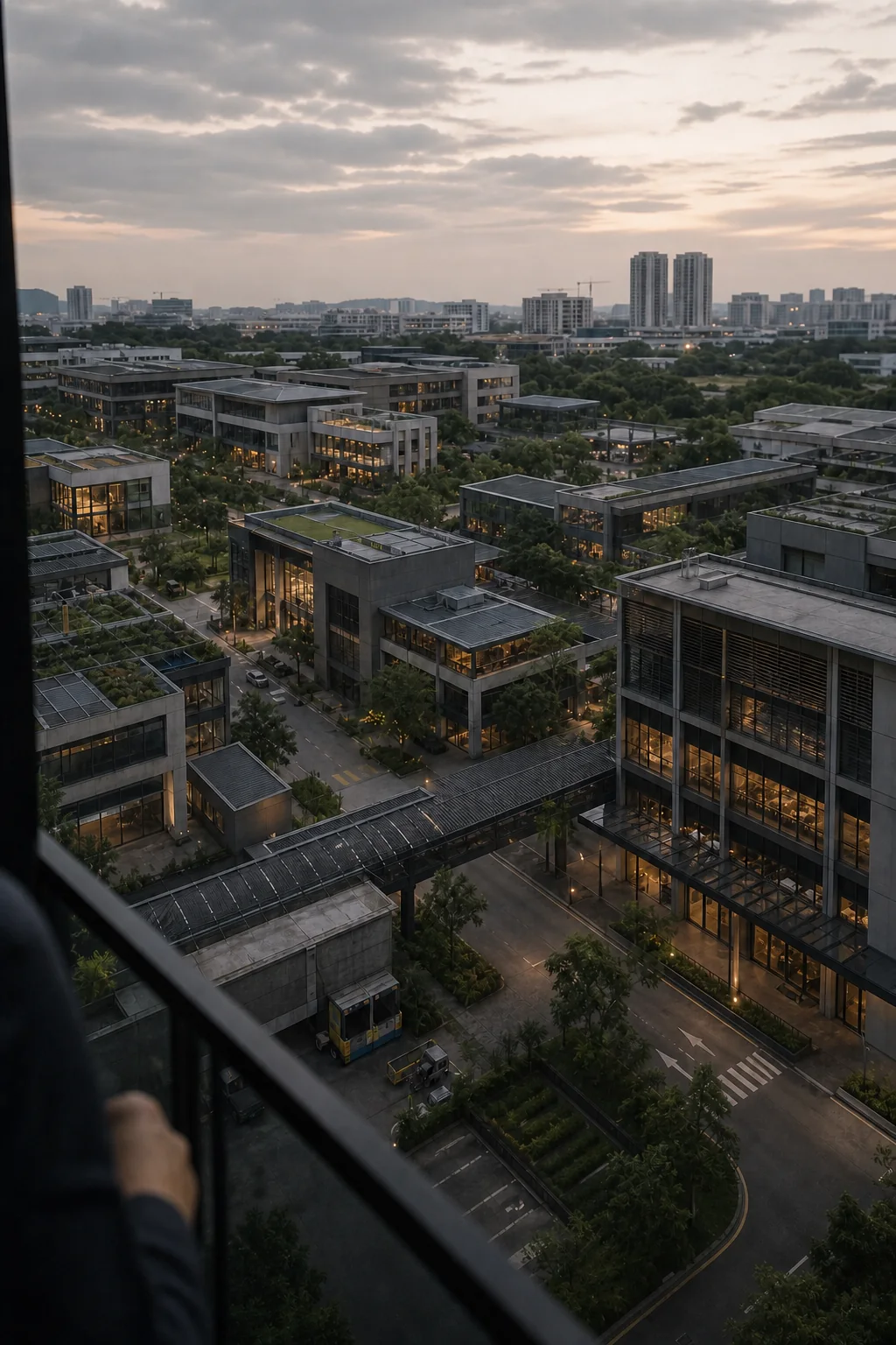 A connected commercial district at dusk with multiple operating properties.