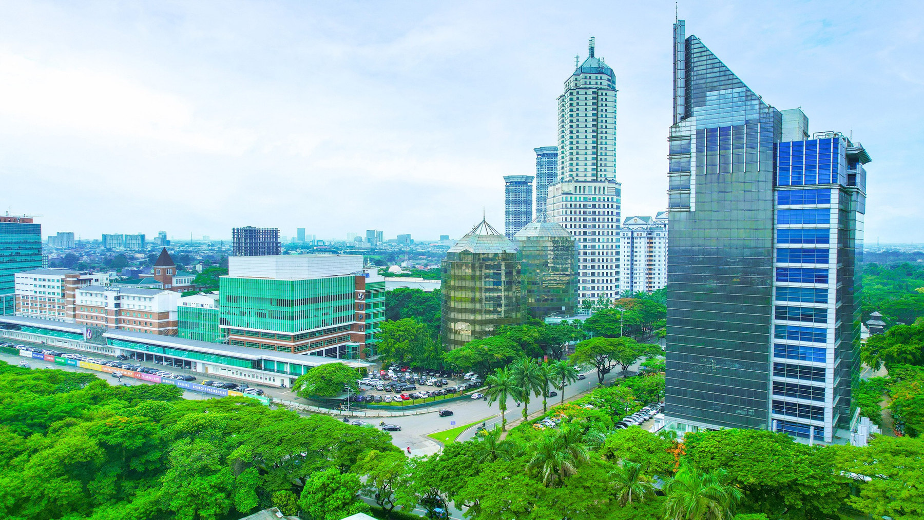 Aerial view of Lippo Village with university, hospital, and office towers.